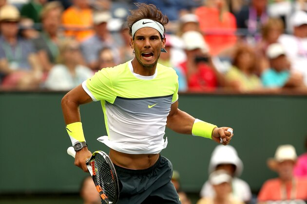 INDIAN WELLS, CA - MARCH 18:  Rafael Nadal of Spain celebrates match point against Gilles Simon of France during day ten of the BNP Paribas Open at the Indian Wells Tennis Garden on March 18, 2015 in Indian Wells, California.  (Photo by Matthew Stockman/Getty Images)