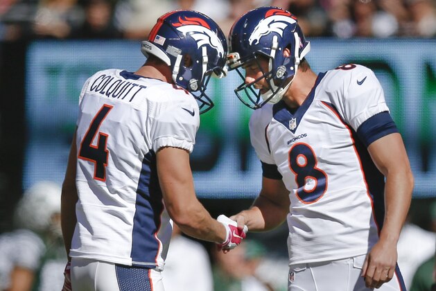 Denver Broncos kicker Brandon McManus (8) is congratulated by punter Britton Colquitt (4) after kicking a field goal against the New York Jets in the first quarter of an NFL football game, Sunday, Oct. 12, 2014, in East Rutherford, N.J. (AP Photo/Kathy Willens)