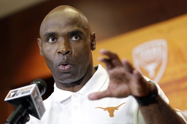 Texas NCAA college head football coach Charlie Strong talks to the media during his weekly news conference, Monday, Sept. 22, 2014, in Austin, Texas. (AP Photo/Eric Gay)