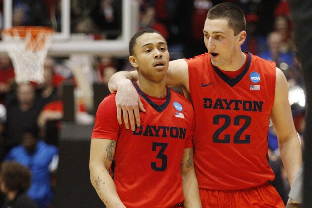 Dayton's Bobby Wehrli (22) talks with Kyle Davis (3) in the second half of a first round NCAA tournament basketball game against Boise State Wednesday, March 18, 2015, in Dayton, Ohio. (AP Photo/Skip Peterson)