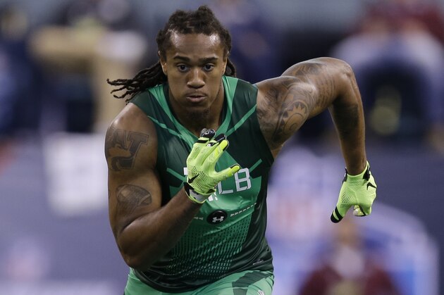 Washington linebacker Shaq Thompson runs a drill at the NFL football scouting combine in Indianapolis, Sunday, Feb. 22, 2015. (AP Photo/Julio Cortez)