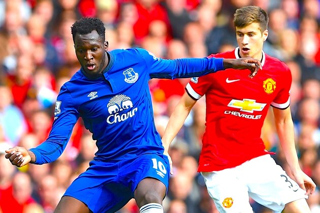 MANCHESTER, ENGLAND - OCTOBER 05:  Romelu Lukaku of Everton competes with Patrick McNair of Manchester United during the Barclays Premier League match between Manchester United and Everton at Old Trafford on October 5, 2014 in Manchester, England.  (Photo by Michael Regan/Getty Images)