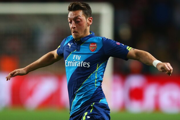 MONACO - MARCH 17:  Mesut Oezil of Arsenal in action during the UEFA Champions League round of 16 second leg match between AS Monaco and Arsenal at Stade Louis II on March 17, 2015 in Monaco, Monaco.  (Photo by Michael Steele/Getty Images)