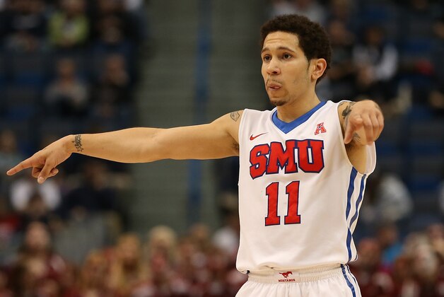 HARTFORD, CT - MARCH 14:   Nic Moore #11 of the Southern Methodist Mustangs gestures during the final moment of a win over the Temple Owls in a semifinal  game of the 2015 AAC Championships at the XL Center on March, 14, 2015 in Hartford, Connecticut. (Photo by Jim Rogash/Getty Images)
