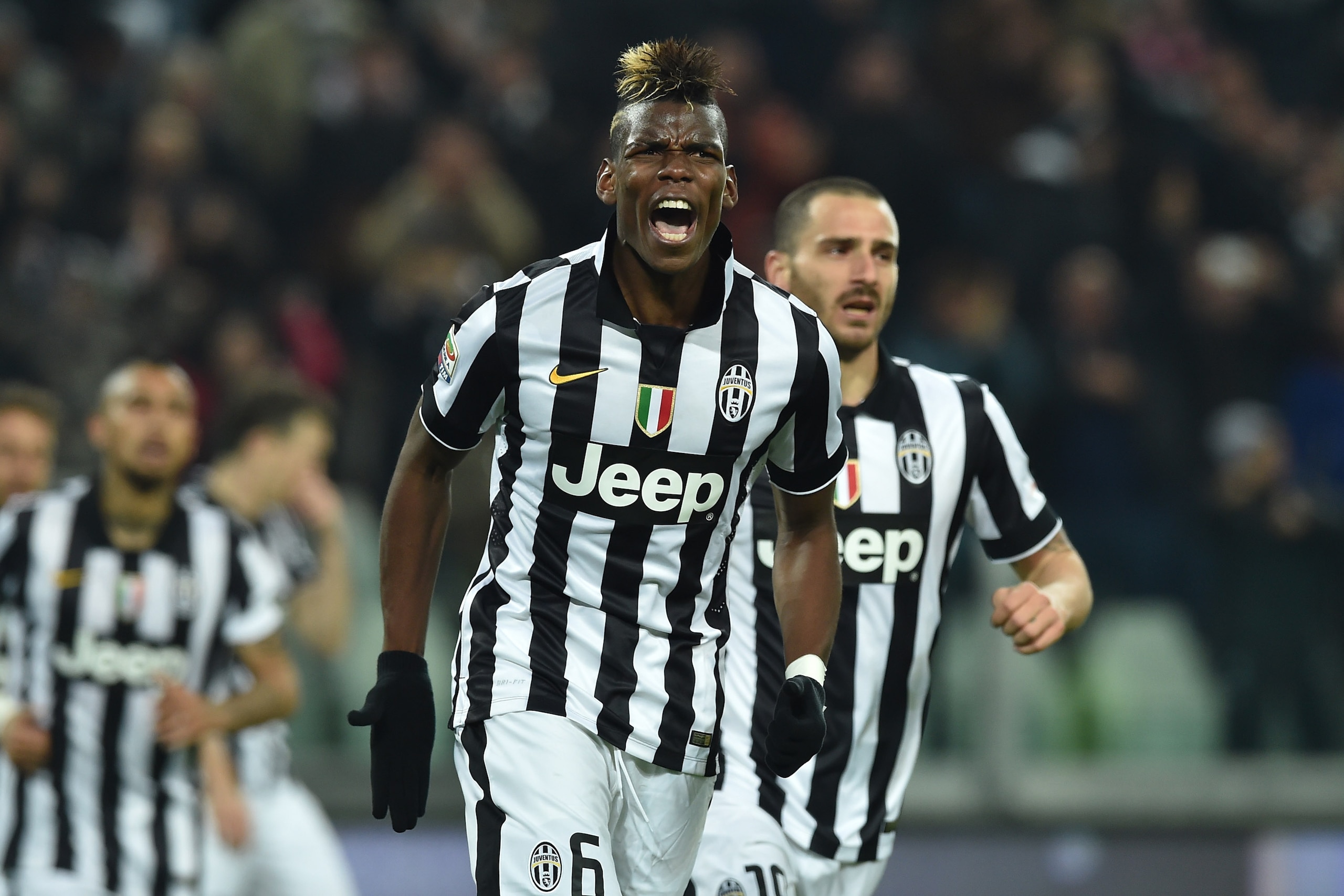 TURIN, ITALY - MARCH 09:  Paul Pogba of Juventus FC celebrates after scoring the opening goal during the Serie A match between Juventus FC and US Sassuolo Calcio at Juventus Arena on March 9, 2015 in Turin, Italy.  (Photo by Valerio Pennicino/Getty Images)