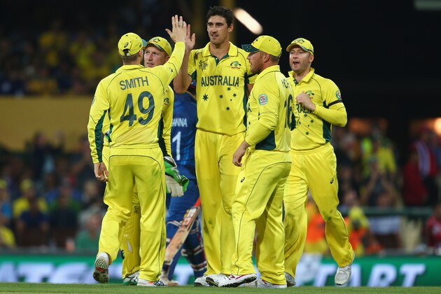 SYDNEY, AUSTRALIA - MARCH 08:  Mitchell Starc of Australia celebrates with his team mates after taking the wicket of Sachithra Senanayake of Sri Lanka  during the 2015 ICC Cricket World Cup match between Australia and Sri Lanka at Sydney Cricket Ground on March 8, 2015 in Sydney, Australia.  (Photo by Mark Kolbe/Getty Images)
