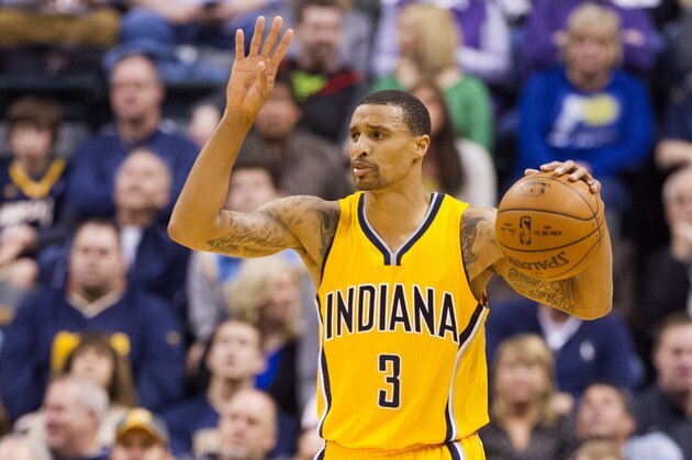 Indiana Pacers guard George Hill (3) brings the ball up court during the first half of an NBA basketball game, Saturday, March 14, 2015, in Indianapolis. (AP Photo/Doug McSchooler)