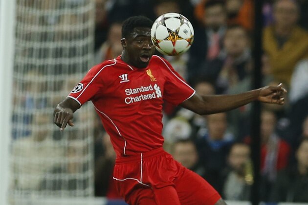 Liverpool's Kolo Toure controls the ball during a Group B Champions League soccer match between Real Madrid and Liverpool at the Santiago Bernabeu stadium in Madrid, Spain, Tuesday Nov. 4, 2014. (AP Photo/Paul White)