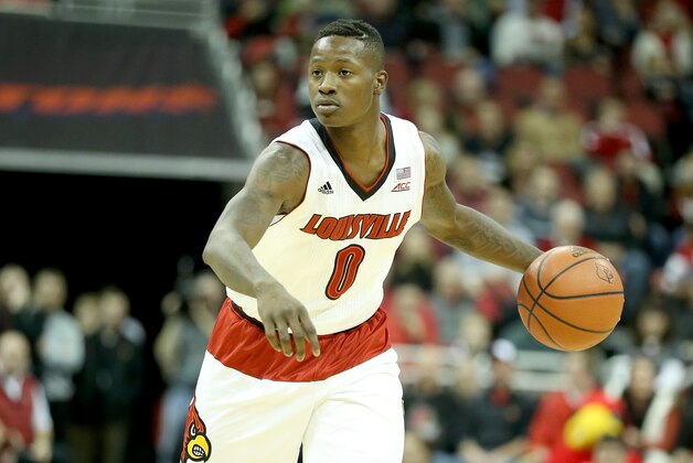 LOUISVILLE, KY - NOVEMBER 26:  Terry Rozier #0 of the Louisville Cardinals dribbles the ball during the game against the Cleveland State Vikings at KFC YUM! Center on November 26, 2014 in Louisville, Kentucky.  (Photo by Andy Lyons/Getty Images)