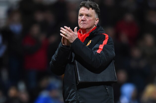 PRESTON, ENGLAND - FEBRUARY 16:  Manager Louis van Gaal of Manchester United applauds the fans during the FA Cup Fifth round match between Preston North End and Manchester United at Deepdale on February 16, 2015 in Preston, England  (Photo by Michael Regan/Getty Images)