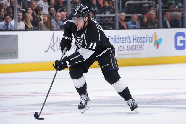 LOS ANGELES, CA - MARCH 16: Anze Kopitar #11 of the Los Angeles Kings handles the puck during a game against the Arizona Coyotes at STAPLES Center on March 16, 2015 in Los Angeles, California. (Photo by Juan Ocampo/NHLI via Getty Images)