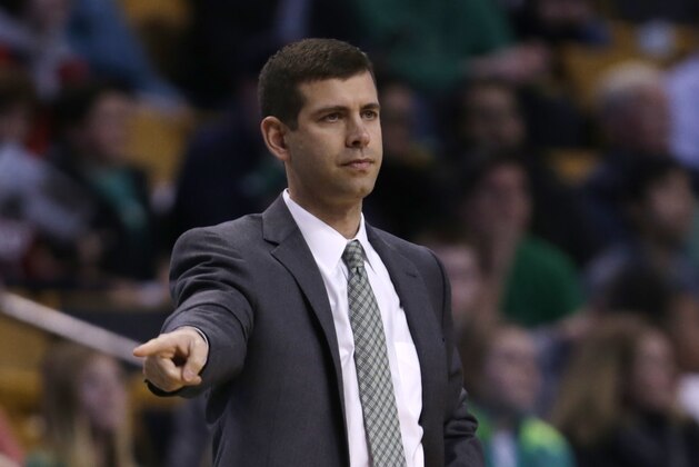 Boston Celtics head coach Brad Stevens during the first quarter of an NBA basketball game in Boston, Friday, March 13, 2015. (AP Photo/Charles Krupa)
