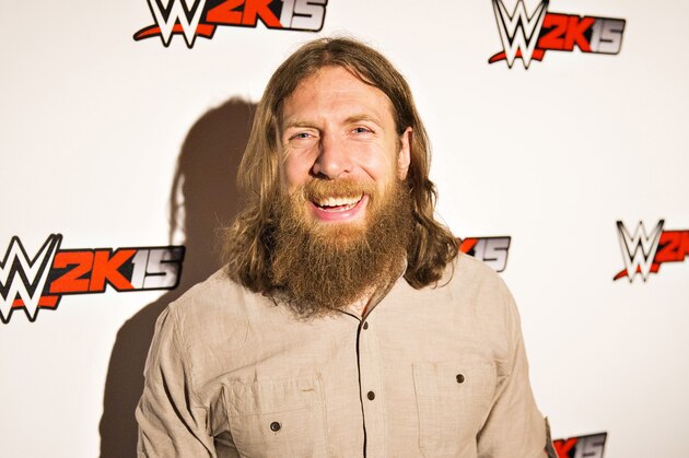 IMAGE DISTRIBUTED FOR 2K - WWE Superstar Daniel Bryan is all smiles at the WWE 2K15 Press Event at Cicada Restaurant, on Saturday, August 16, 2014 in Los Angeles. (Photo by Colin Young-Wolff/Invision for 2K/AP Images)