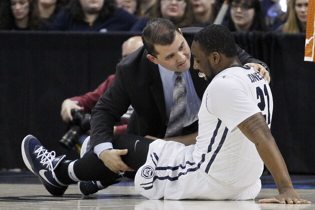 PITTSBURGH, PA - MARCH 19:  Roosevelt Jones #21 of the Butler Bulldogs reacts after injuring his leg in the second half against the Texas Longhorns during the second round of the 2015 NCAA Men's Basketball Tournament at Consol Energy Center on March 19, 2015 in Pittsburgh, Pennsylvania.  (Photo by Justin K. Aller/Getty Images)