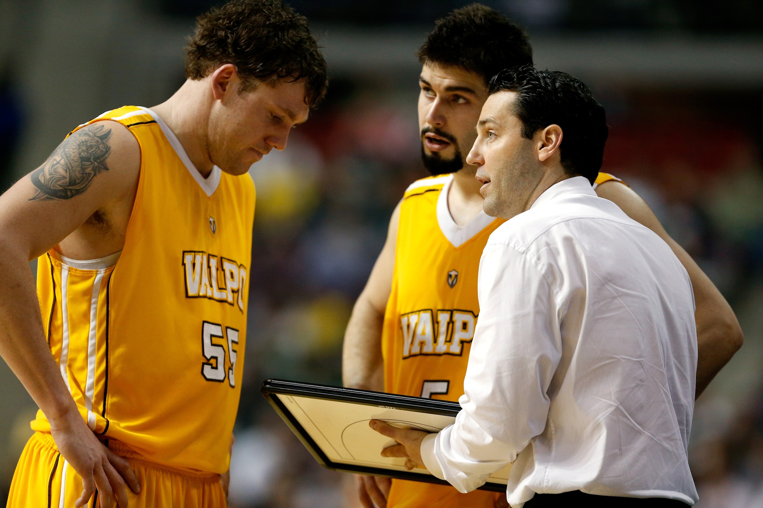 AUBURN HILLS, MI - MARCH 21: Head coach Bryce Drew of the Valparaiso Crusaders talks with Kevin Van Wijk #55 (L) and Bobby Capobianco #5 against the Michigan State Spartans during the second round of the 2013 NCAA Men's Basketball Tournament at at The Palace of Auburn Hills on March 21, 2013 in Auburn Hills, Michigan. (Photo by Gregory Shamus/Getty Images) AUBURN HILLS, MI - MARCH 21: Head coach Bryce Drew of the Valparaiso Crusaders talks with Kevin Van Wijk #55 (L) and Bobby Capobianco #5 against the Michigan State Spartans during the second round of the 2013 NCAA Men's Basketball Tournament at at The Palace of Auburn Hills on March 21, 2013 in Auburn Hills, Michigan. (Photo by Gregory Shamus/Getty Images)
