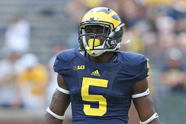 ANN ARBOR, MI - AUGUST 30:  Jabrill Peppers #5 of the Michigan Wolverines warms up prior to the start of the game against the Appalachian State Mountaineers on August 30, 2014 in Ann Arbor, Michigan. The Wolverines defeated the Mountaineers 52-14.  (Photo by Leon Halip/Getty Images)