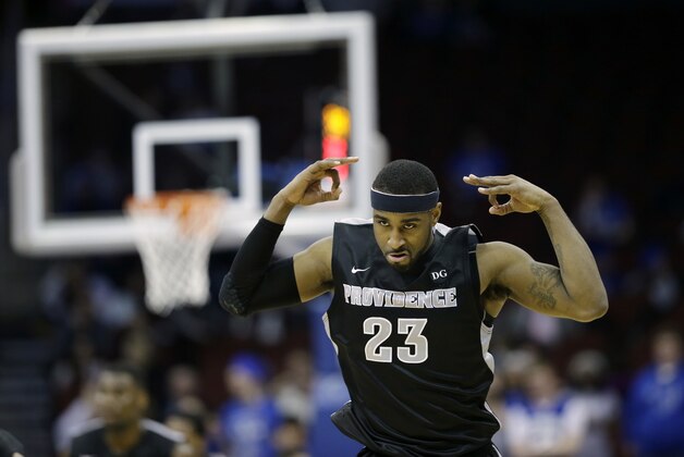 Providence forward LaDontae Henton (23) celebrates his 3-point basket during the second half of an NCAA college basketball game against Seton Hall, Wednesday, March 4, 2015, in Newark, N.J. Providence won 79-66. Henton had 21 points for Providence. (AP Photo/Mel Evans)