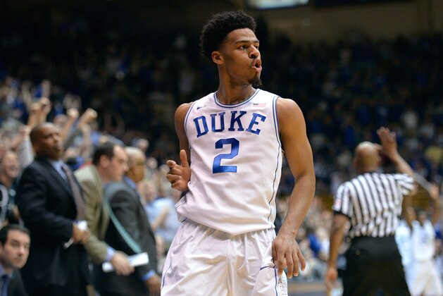 DURHAM, NC - FEBRUARY 07:  Quinn Cook #2 of the Duke Blue Devils reacts after making a three-point basket against the Notre Dame Fighting Irish during their game at Cameron Indoor Stadium on February 7, 2015 in Durham, North Carolina.  (Photo by Grant Halverson/Getty Images)