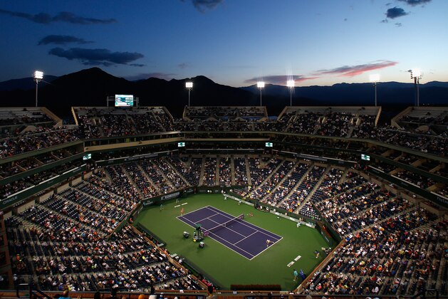 INDIAN WELLS, CA - MARCH 19:  A general view of Sabine Lisicki of Germany in action against Flavia Pennetta of Italy during day eleven of the BNP Paribas Open tennis at the Indian Wells Tennis Garden on March 19, 2015 in Indian Wells, California.  (Photo by Julian Finney/Getty Images)
