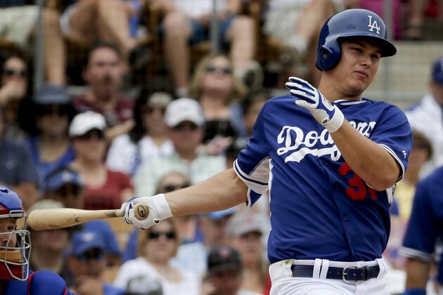 Los Angeles Dodgers' Joc Pederson bats against the Chicago Cubs during a spring training baseball exhibition game in Glendale, Ariz., on Wednesday, March 18, 2015. (AP Photo/Chris Carlson)