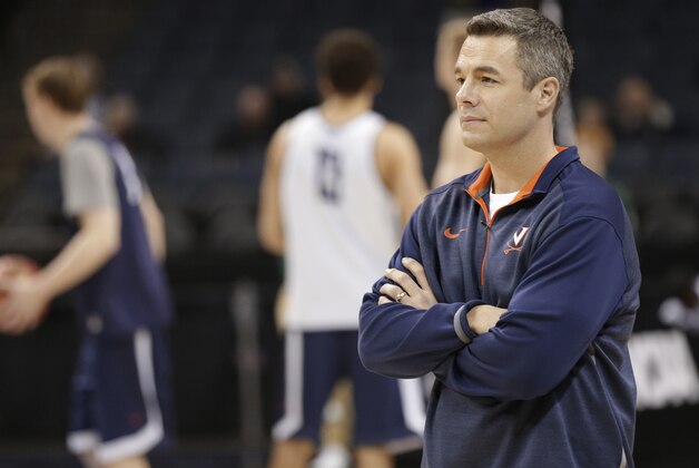 Virginia head coach Tony Bennett watches his team during practice at the NCAA college basketball tournament in Charlotte, N.C., Thursday, March 19, 2015. Virginia plays Belmont in the second round on Friday. (AP Photo/Nell Redmond)