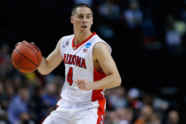 PORTLAND, OR - MARCH 19: T.J. McConnell #4 of the Arizona Wildcats dribbles in the first half against Texas Southern Tigers during the second round of the 2015 NCAA Men's Basketball Tournament at Moda Center on March 19, 2015 in Portland, Oregon. (Photo by Jonathan Ferrey/Getty Images) PORTLAND, OR - MARCH 19: T.J. McConnell #4 of the Arizona Wildcats dribbles in the first half against Texas Southern Tigers during the second round of the 2015 NCAA Men's Basketball Tournament at Moda Center on March 19, 2015 in Portland, Oregon. (Photo by Jonathan Ferrey/Getty Images)