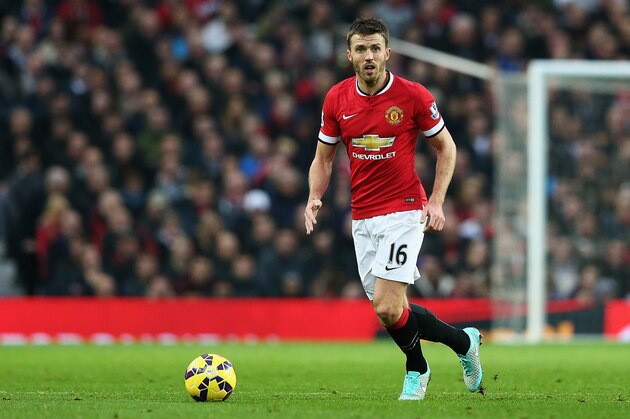MANCHESTER, ENGLAND - NOVEMBER 29:  Michael Carrick of Manchester United in action during the Barclays Premier League match between Manchester United and Hull City at Old Trafford on November 29, 2014 in Manchester, England.  (Photo by Matthew Lewis/Getty Images)