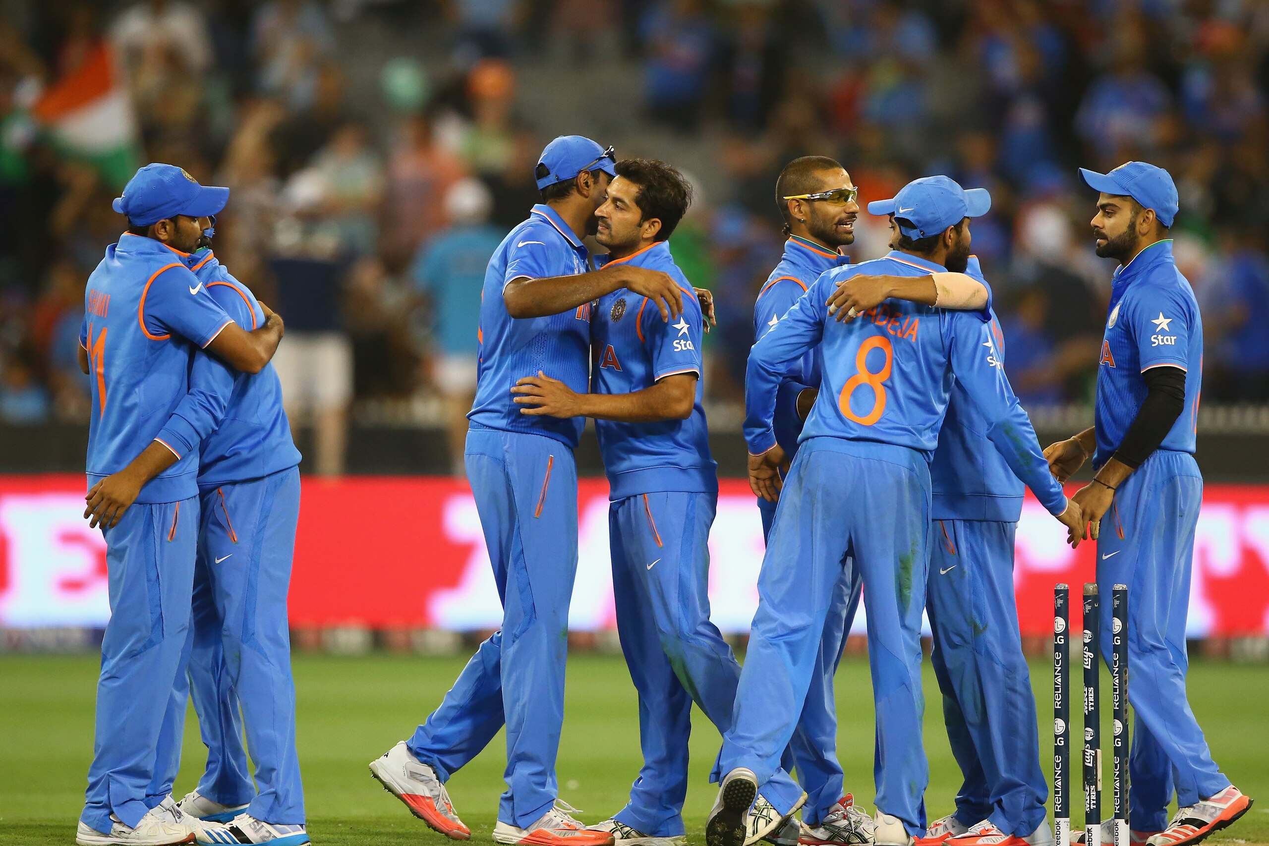 MELBOURNE, AUSTRALIA - MARCH 19:  Players from India celebrate, after India defeated Bangladesh at the 2015 ICC Cricket World Cup match between India and Bangldesh at Melbourne Cricket Ground on March 19, 2015 in Melbourne, Australia.  (Photo by Robert Cianflone/Getty Images)