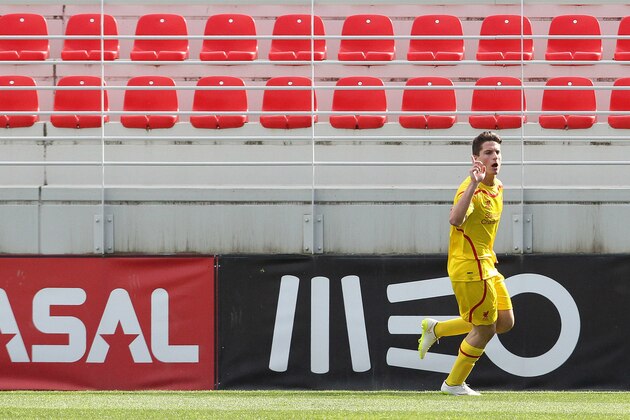 SEIXAL, PORTUGAL - FEBRUARY 24:  Liverpool's forward Sergi Canos celebrates scoring Liverpool's goal in action during the UEFA Youth League match between SL Benfica and Liverpool FC on February 24, 2015 in Seixal, Portugal.  (Photo by Carlos Rodrigues/Getty Images for UEFA)