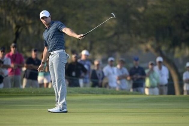 Rory McIlroy, of Northern Ireland, reacts as he barely misses a putt for birdie on the 11th hole during the second round of the Arnold Palmer Invitational golf tournament in Orlando, Fla., Friday, March 20, 2015.(AP Photo/Phelan M. Ebenhack)