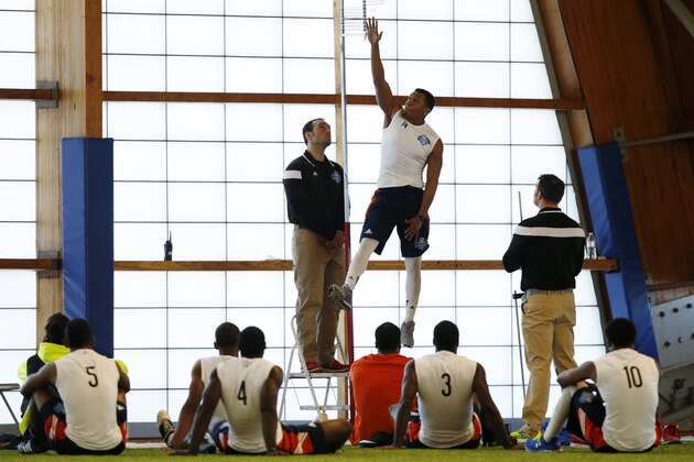 David McDaniel, of Western Illinois University, does the vertical jump test during an NFL Regional Combine on Saturday, March 7, 2015, in Lake Forest, Ill. (AP Photo/Andrew A. Nelles)