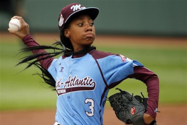 FILE - In this Aug. 15, 2014, file photo, Pennsylvania's Mo'ne Davis delivers in the fifth inning against Tennessee during a baseball game in United States pool play at the Little League World Series tournament in South Williamsport, Pa. The Disney Channel says development is under way on the biographical film, titled