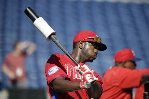 Philadelphia Phillies left fielder Domonic Brown waits to bat during batting practice before a spring training baseball exhibition game against the New York Yankees, Tuesday, March 3, 2015, in Clearwater, Fla. (AP Photo/Lynne Sladky)