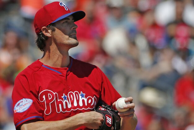 Philadelphia Phillies starting pitcher Cole Hamels reacts on the mound in a spring training baseball game in Clearwater, Fla., Monday, March 16, 2015. Hamels allowed five runs in two innings. (AP Photo/Kathy Willens)