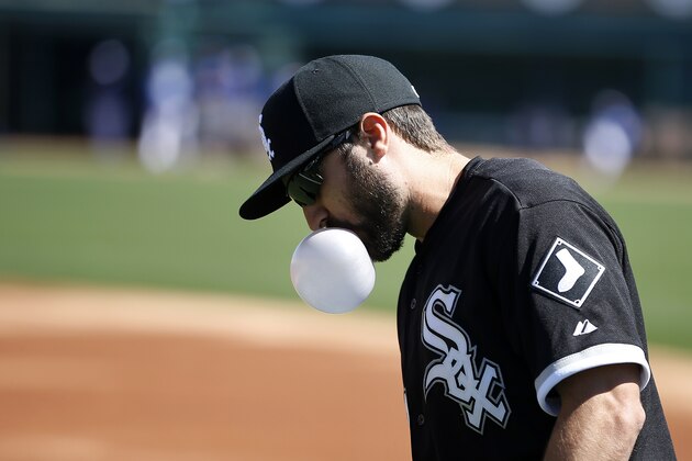 Chicago White Sox's Adam Eaton blows a bubble with his gum before a spring training exhibition baseball game against the Los Angeles Dodgers, Wednesday, March 4, 2015, in Phoenix. (AP Photo/John Locher)
