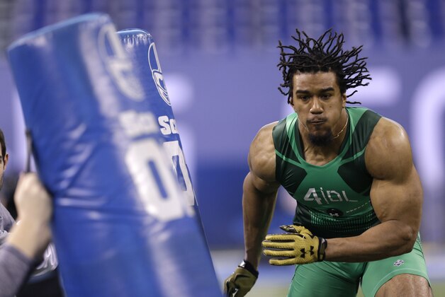Clemson defensive lineman Vic Beasley runs a drill at the NFL football scouting combine in Indianapolis, Sunday, Feb. 22, 2015. (AP Photo/David J. Phillip)