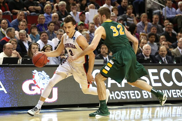 SEATTLE, WA - MARCH 20:  Kyle Dranginis #3 of the Gonzaga Bulldogs dribbles against Evan Wesenberg #32 of the North Dakota State Bison in the second half of the game during the second round of the 2015 NCAA Men's Basketball Tournament at KeyArena on March 20, 2015 in Seattle, Washington.  (Photo by Otto Greule Jr/Getty Images)