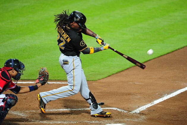 ATLANTA, GA - SEPTEMBER 22: Andrew McCutchen #22 of the Pittsburgh Pirates hits a sixth inning solo home run against the Atlanta Braves at Turner Field on September 22, 2014 in Atlanta, Georgia. (Photo by Scott Cunningham/Getty Images)