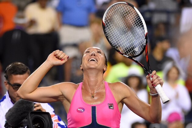 Jelena Jankovic, of Serbia, celebrates her win over Sabine Lisicki, of Germany, after their match at the BNP Paribas Open tennis tournament, Friday, March 20, 2015 in Indian Wells, Calif. Jankovic won 3-6, 6-3, 6-1.(AP Photo/Mark J. Terrill)