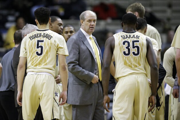 Vanderbilt head coach Kevin Stallings talks to his players in the second half of an NCAA college basketball game against Mississippi State Wednesday, March 4, 2015, in Nashville, Tenn. Vanderbilt won 66-56. (AP Photo/Mark Humphrey)