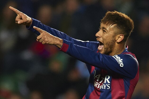 ELCHE, SPAIN - JANUARY 24:  Neymar JR of Barcelona celebrates after scoring during the La Liga match between Elche FC and FC Barcelona at Estadio Manuel Martinez Valero on January 24, 2015 in Elche, Spain.  (Photo by Manuel Queimadelos Alonso/Getty Images)