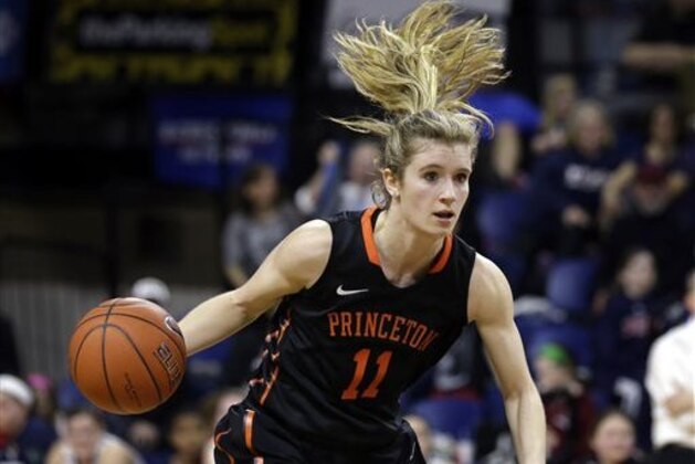FILE - In this March 10, 2015, file photo, Princeton guard Blake Dietrick (11) dribbles the ball up court during the second half of an NCAA college basketball game against Pennsylvania in Philadelphia. Dietrick has been instrumental in the Tigers undefeated season. She's the team's leading scorer at 14.9 points a game. (AP Photo/Mel Evans, File)