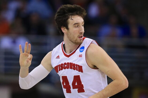 Wisconsin's Frank Kaminsky (44) gestures after hitting a three-pointer during the first half of an NCAA tournament college basketball game against Coastal Carolina in the Round of 64 in Omaha, Neb., Friday, March 20, 2015. (AP Photo/Nati Harnik)