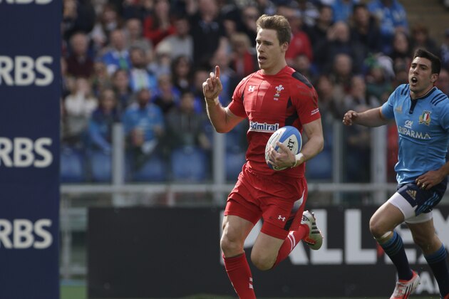 Wales' Liam Williams runs on his way to score a try during the Six Nations international rugby union match between Italy and Wales at Rome's Olympic stadium, Saturday, March 21, 2015. (AP Photo/Alessandra Tarantino)