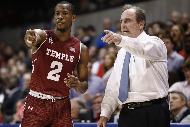 Temple's head coach Fran Dunphy gestures as he talks with Will Cummings (2) during the second half of an NCAA basketball game against SMU, Thursday, Feb. 19, 2015, in Dallas. SMU won 67-58. (AP Photo/Jim Cowsert)