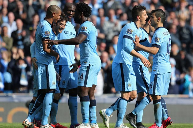 MANCHESTER, ENGLAND - MARCH 21:  David Silva of Manchester City (2L) celebrates scoring their third goal with team mates during the Barclays Premier League match between Manchester City and West Bromwich Albion at Etihad Stadium on March 21, 2015 in Manchester, England.  (Photo by Jan Kruger/Getty Images)