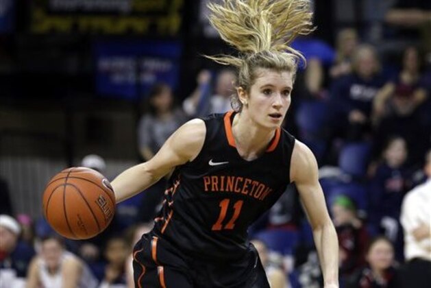 FILE - In this March 10, 2015, file photo, Princeton guard Blake Dietrick (11) dribbles the ball up court during the second half of an NCAA college basketball game against Pennsylvania in Philadelphia. Dietrick has been instrumental in the Tigers undefeated season. She's the team's leading scorer at 14.9 points a game. (AP Photo/Mel Evans, File)