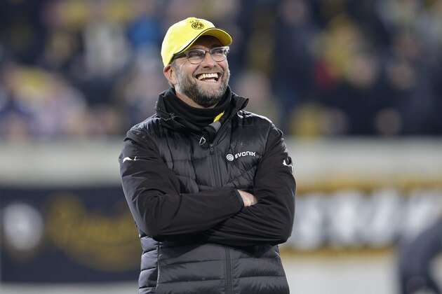Dortmund's head coach Juergen Klopp smiles prior to the German soccer cup round of sixteen match between third division team Dynamo Dresden and first division team Borussia Dortmund in Dresden, Germany, Tuesday, March 3, 2015. (AP Photo/Michael Sohn)