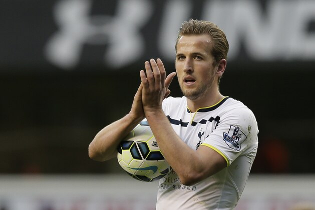 Tottenham Hotspur’s Harry Kane applauds the crowd after his team won the English Premier League soccer match between Tottenham and Leicester City at White Hart Lane, London, Saturday, March 21, 2015. (AP Photo/Tim Ireland)
