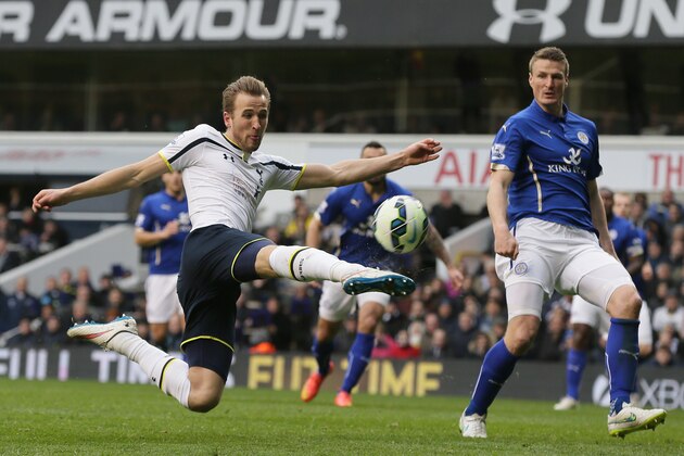 Tottenham Hotspur’s Harry Kane, left, attempts a shot during the English Premier League soccer match between Tottenham and Leicester City at White Hart Lane, London, Saturday, March 21, 2015. (AP Photo/Tim Ireland)